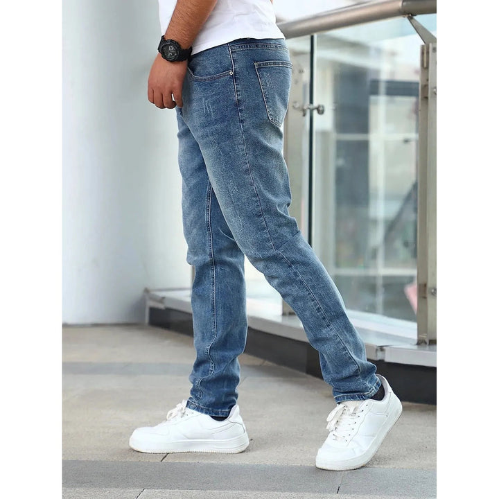Men's Slim Fit Tapered Jeans in Blue, side view